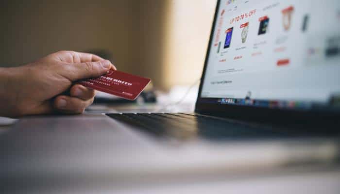 Woman doing online shopping with credit card